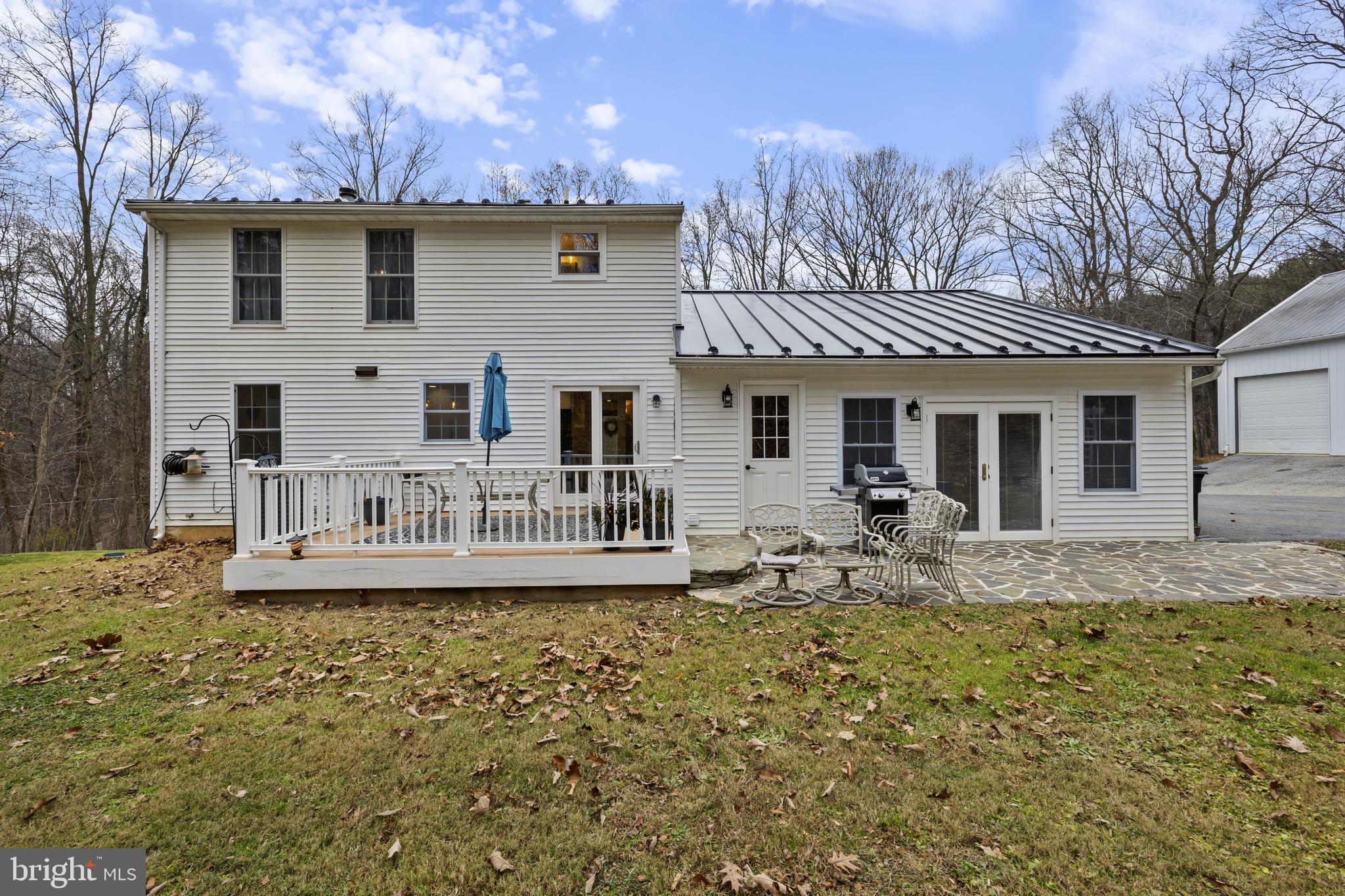 7802 Blue Hill Road Glenville, PA 17329 - Photo 5 of 44 a front view of a house with swimming pool and porch