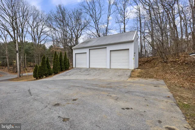 a house with trees in front of it