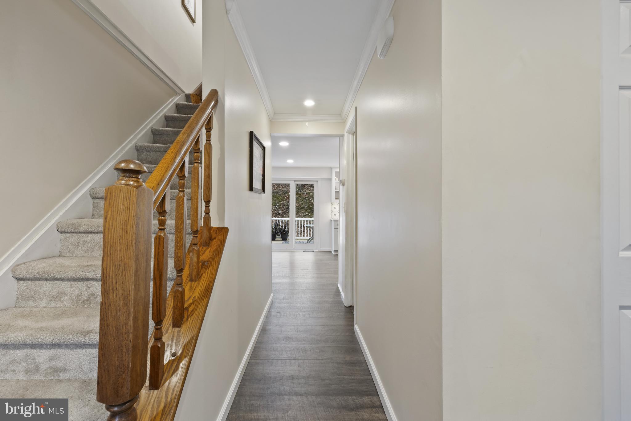 7802 Blue Hill Road Glenville, PA 17329 - Photo 10 of 44 a view of a hallway with wooden floor and staircase
