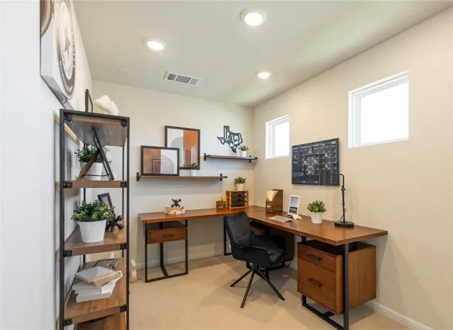 a view of a workspace with kitchen