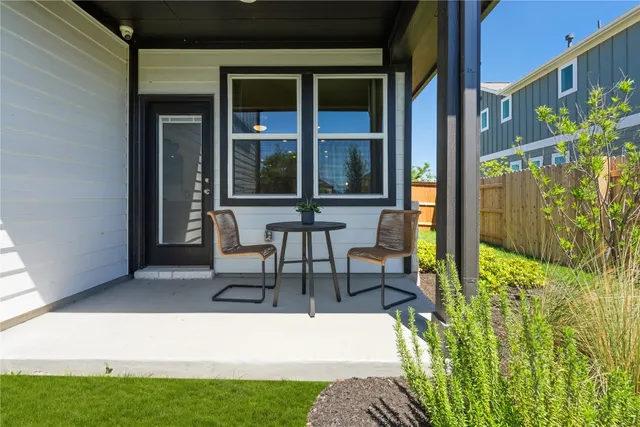 a building outdoor space with patio furniture