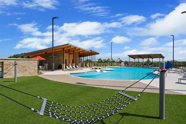 a view of a park with swings