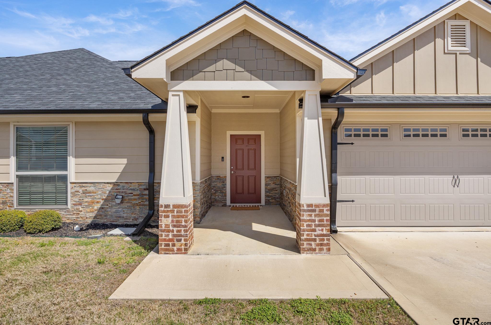 815 East Grande Boulevard, Unit R103 Tyler, TX 75703 - Photo 1 of 25 Sophisticated and charming entrance with craftsman classic columns outside the front door!