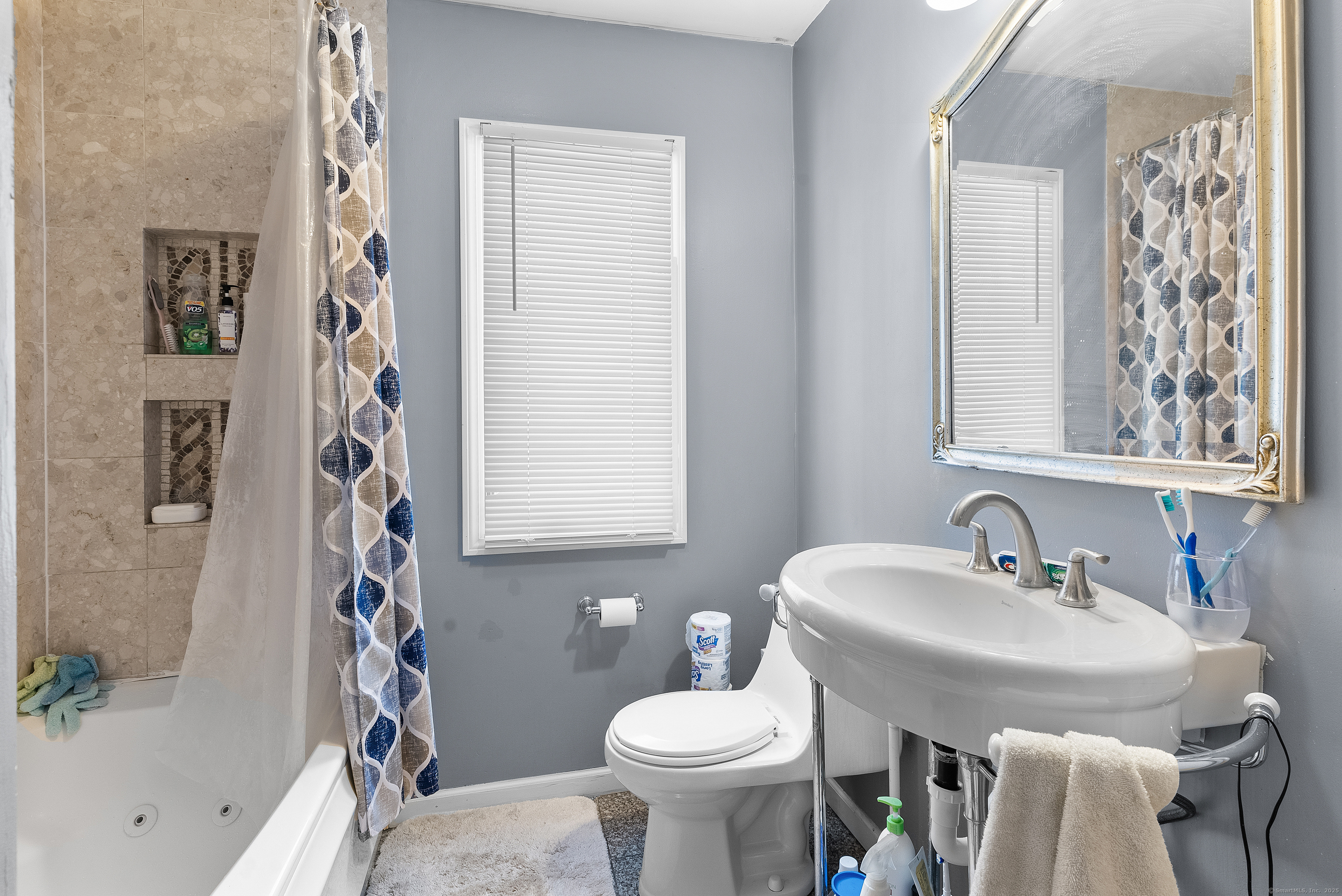 8 Stonecrop Road North Norwalk, CT 06851 - Photo 14 of 15 a bathroom with a sink and toilet