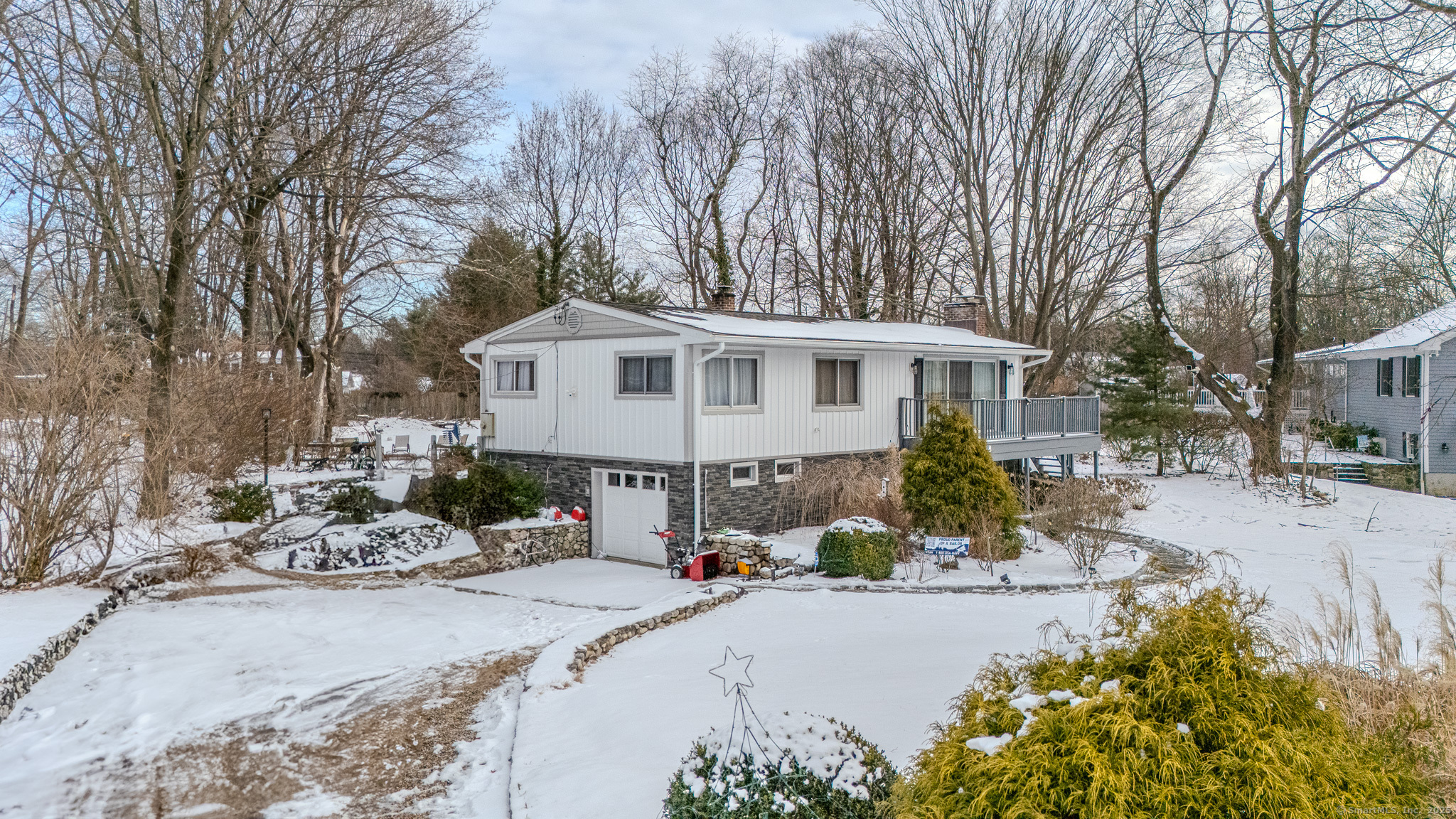 8 Stonecrop Road North Norwalk, CT 06851 - Photo 2 of 15 a front view of a house with sitting area