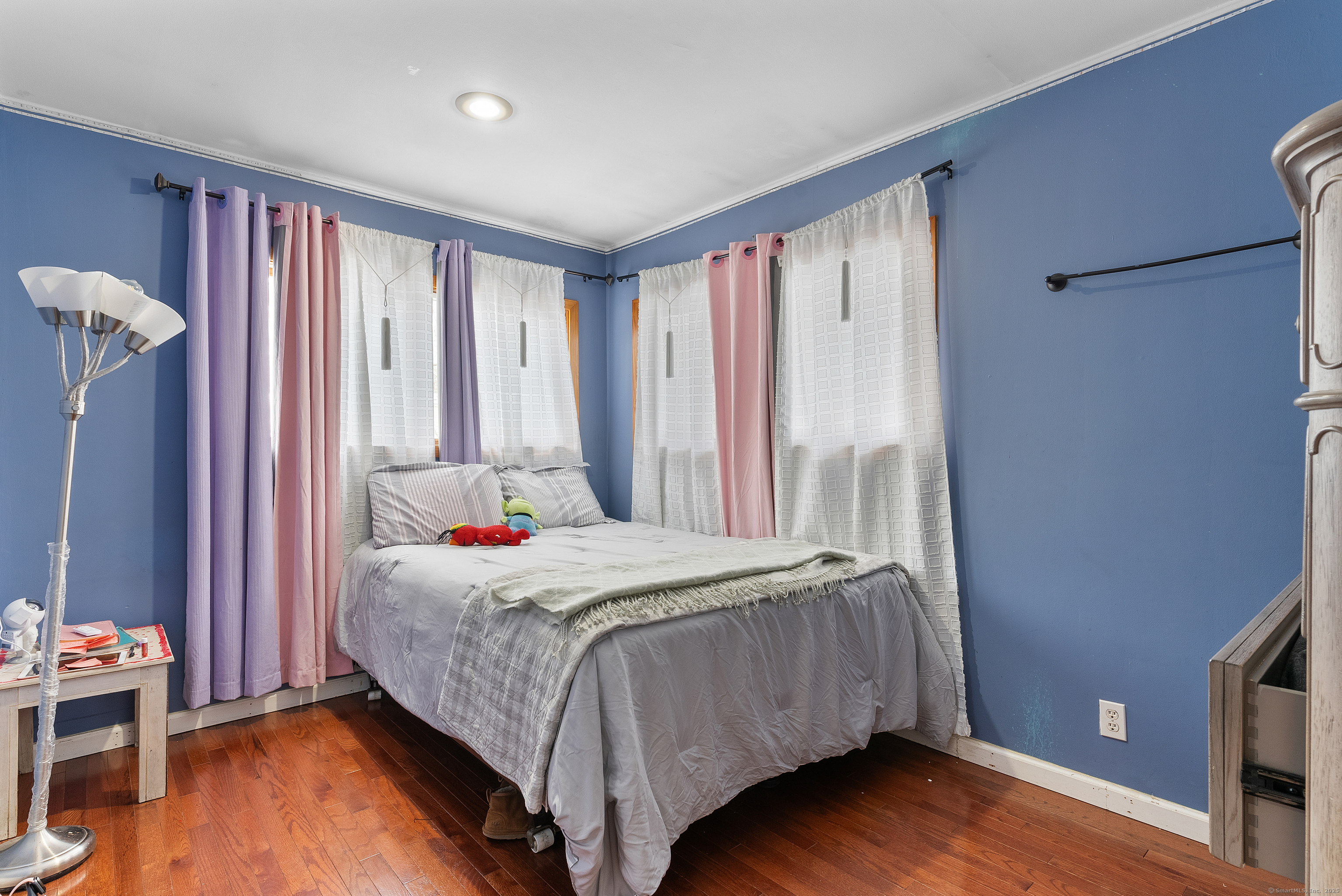 8 Stonecrop Road North Norwalk, CT 06851 - Photo 5 of 15 a bedroom with a bed and a window