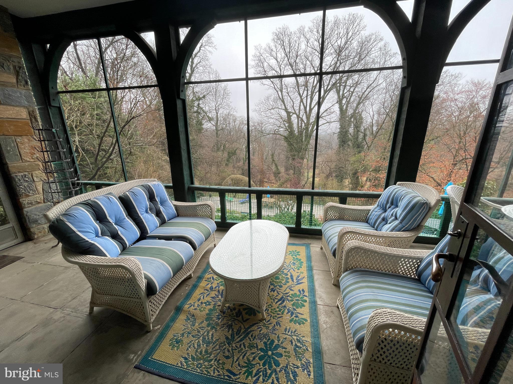 3117 Chain Bridge Road Northwest Washington, DC 20016 - Photo 5 of 26 Full length screened porch overlooks the pool