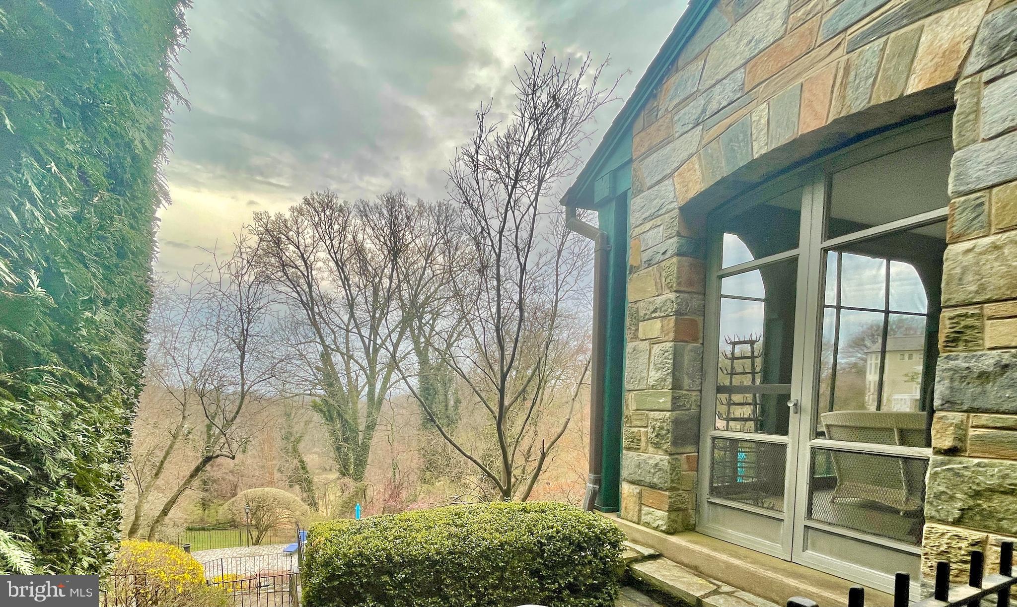3117 Chain Bridge Road Northwest Washington, DC 20016 - Photo 6 of 26 Outdoor angle of the screen porch