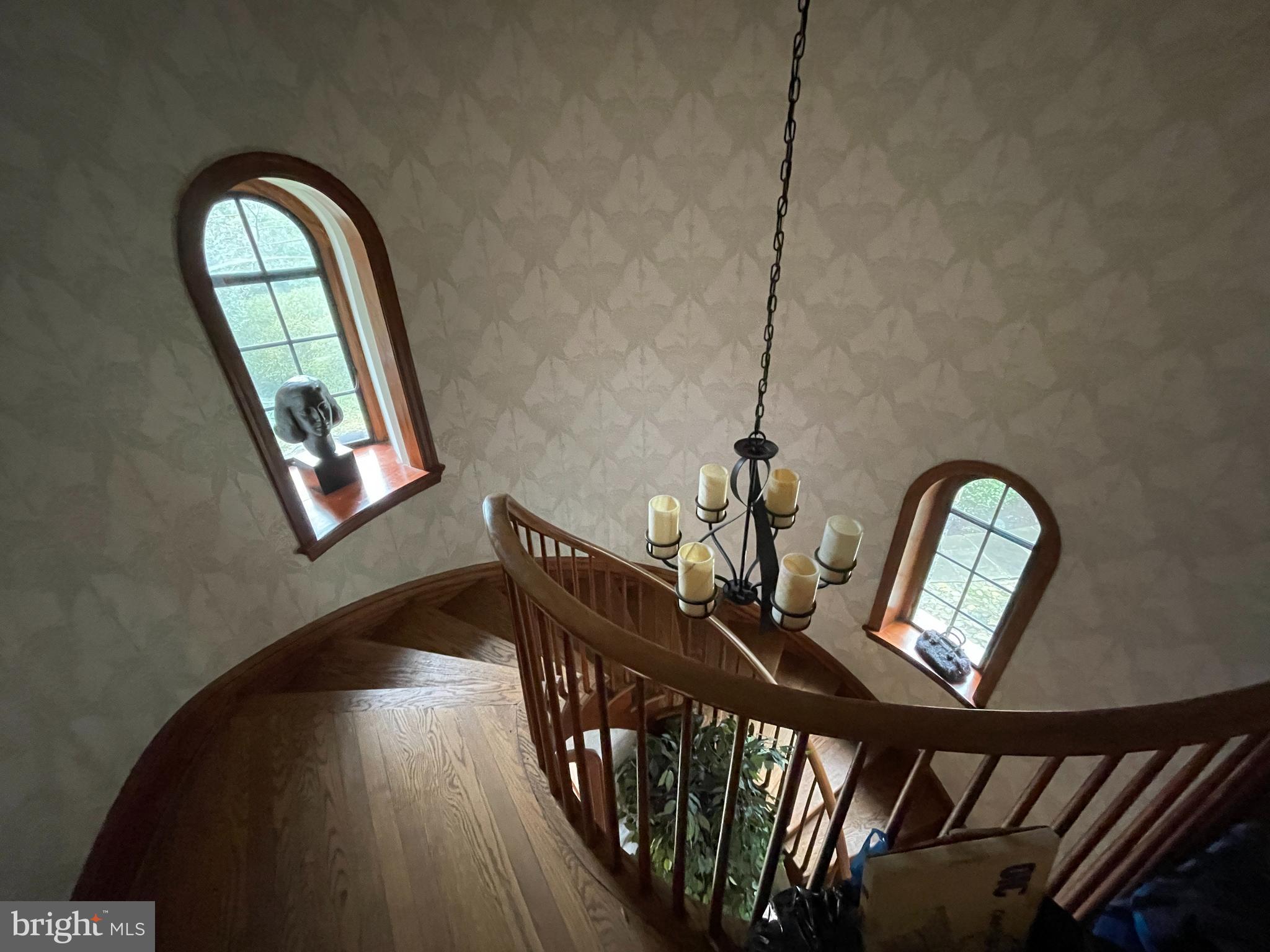 3117 Chain Bridge Road Northwest Washington, DC 20016 - Photo 10 of 26 Stunning curved staircase, original wood banister