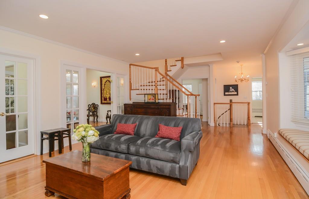 7 Benjamin Road Lexington, MA 02421 - Photo 15 of 42 a living room with furniture and wooden floor