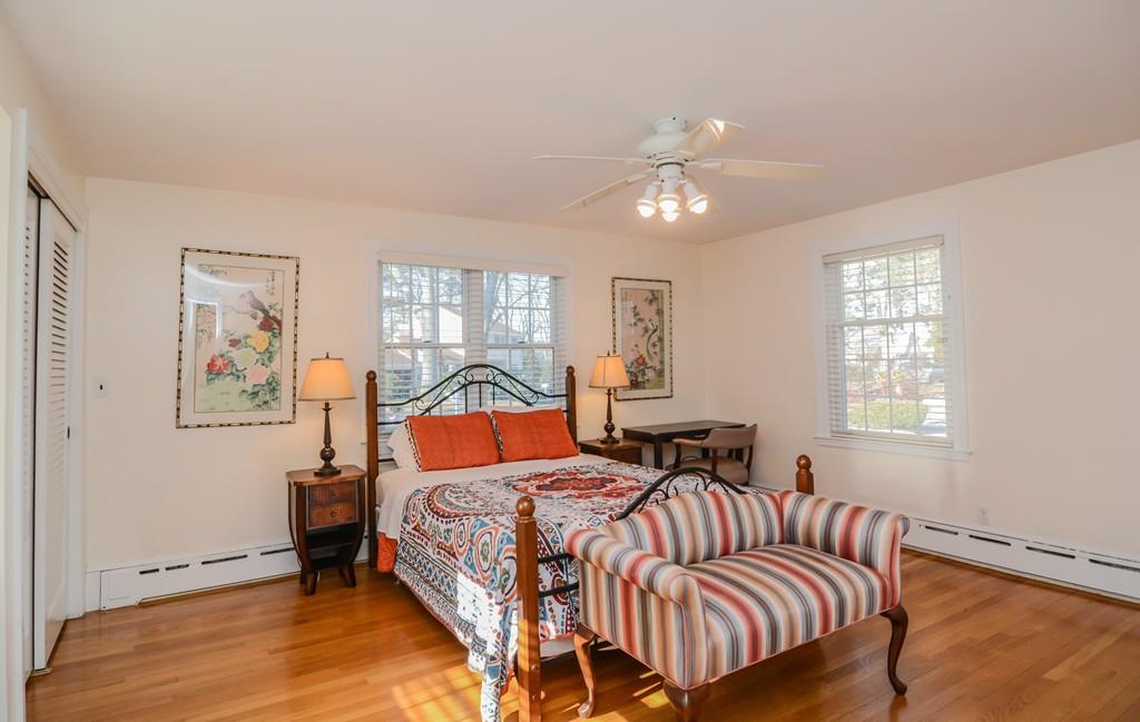 7 Benjamin Road Lexington, MA 02421 - Photo 19 of 42 a bedroom with a bed and window
