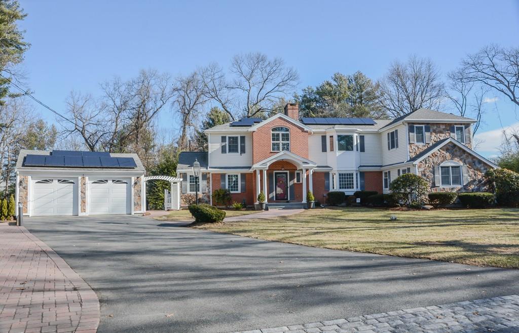 7 Benjamin Road Lexington, MA 02421 - Photo 2 of 42 a front view of a house with a yard