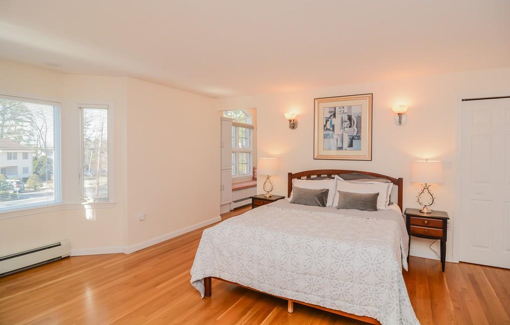 7 Benjamin Road Lexington, MA 02421 - Photo 27 of 42 a bedroom with a bed and a window