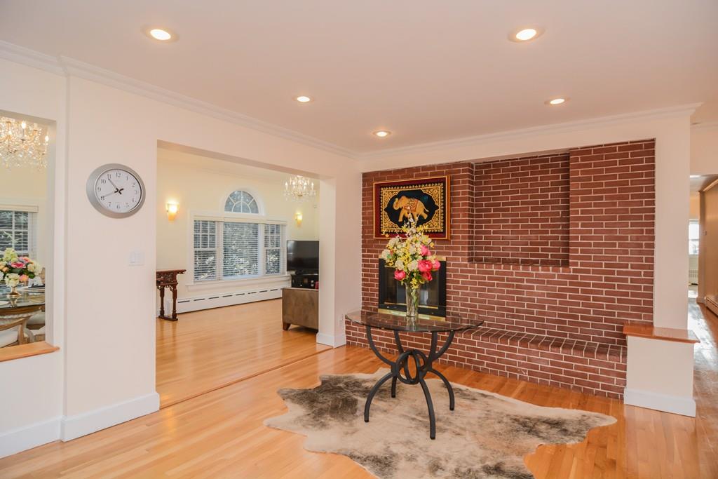 7 Benjamin Road Lexington, MA 02421 - Photo 3 of 42 a living room with furniture and a window