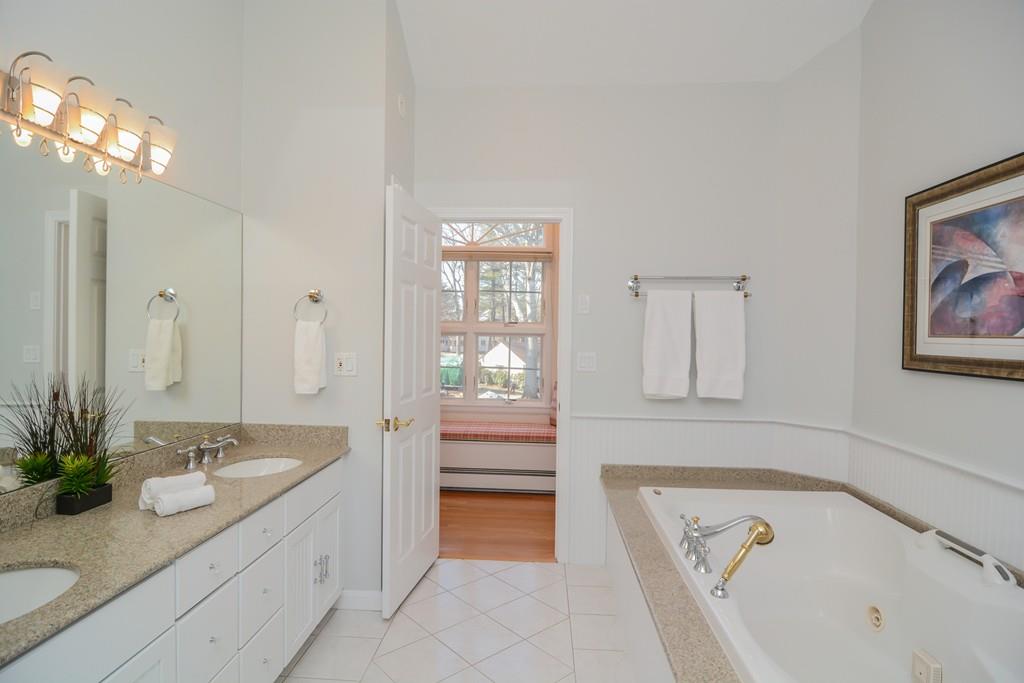 7 Benjamin Road Lexington, MA 02421 - Photo 32 of 42 a spacious bathroom with a tub sink and mirror