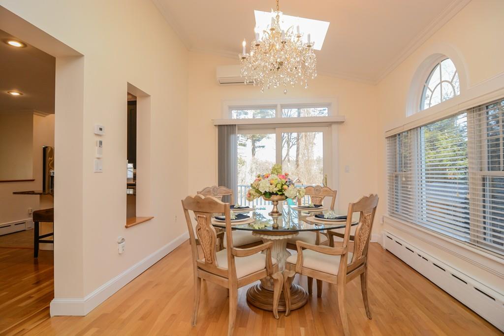 7 Benjamin Road Lexington, MA 02421 - Photo 7 of 42 a view of a dining room with furniture window and wooden floor