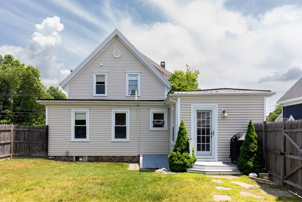 1012 Washington Street Whitman, MA 02382 - Photo 16 of 37 a front view of a house with garden