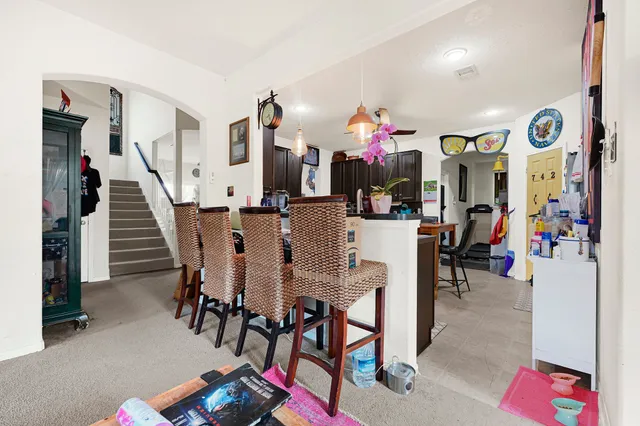 a view of a dining room with furniture