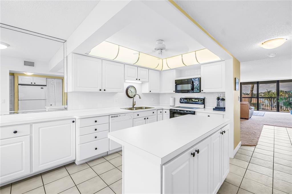9425 Blind Pass Road, Unit 207 St. Pete Beach, FL 33706 - Photo 7 of 45