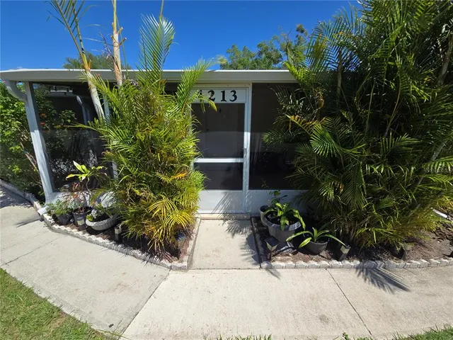 a view of a house with garden
