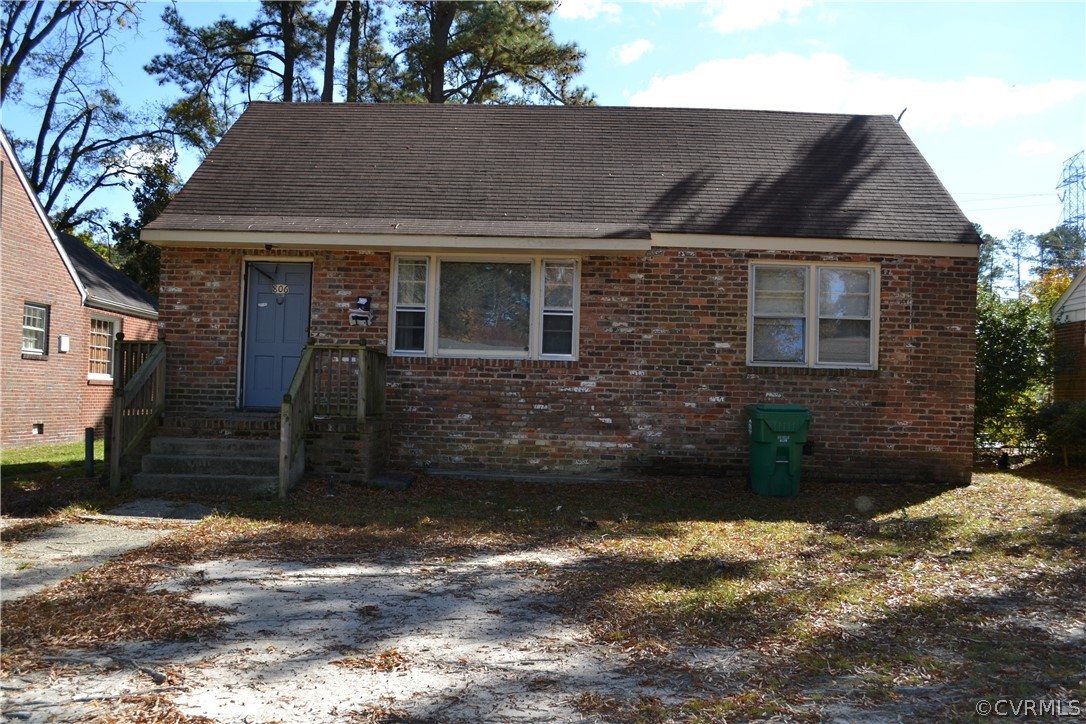 806 Northampton Road Petersburg, VA 23805 - Photo 1 of 11 a front view of a house with a yard