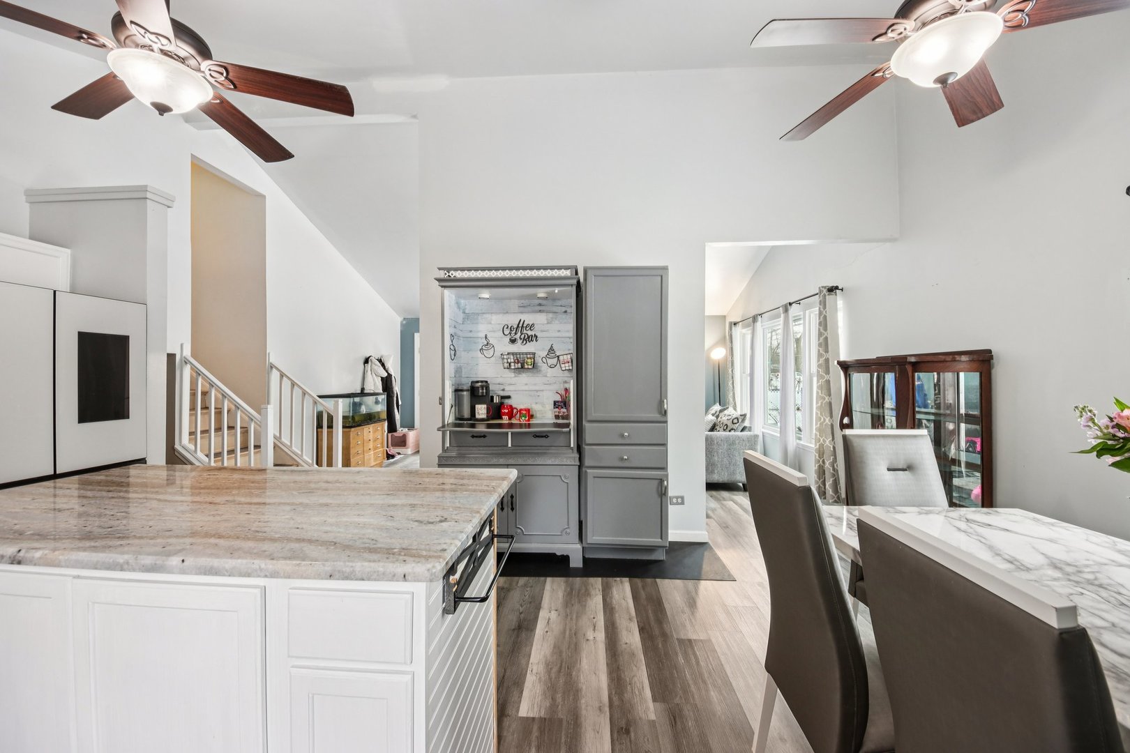 410 Riverside Drive Lakemoor, IL 60051 - Photo 7 of 21 a view of a dining room with furniture and a kitchen