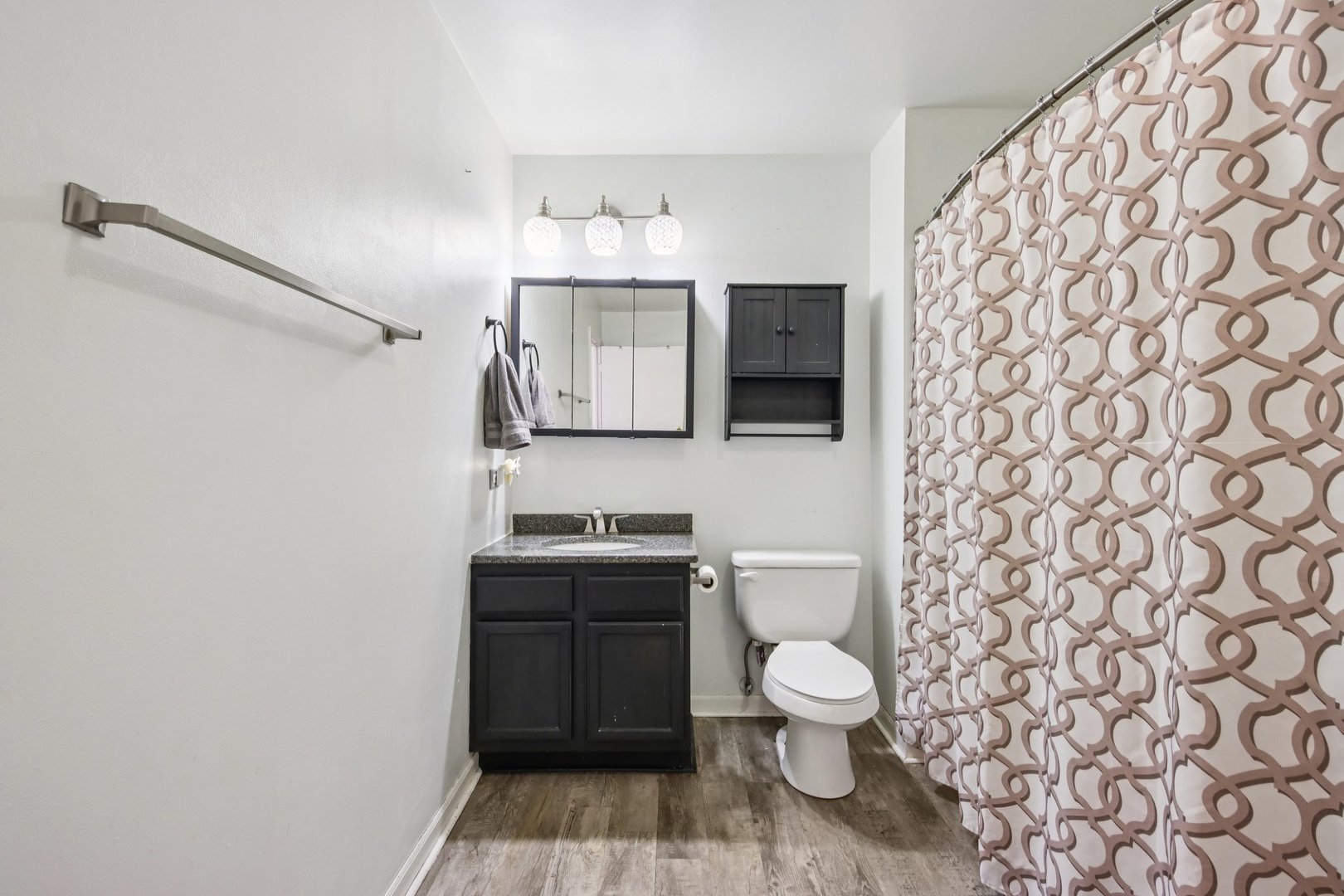 410 Riverside Drive Lakemoor, IL 60051 - Photo 10 of 21 a bathroom with a toilet and a sink