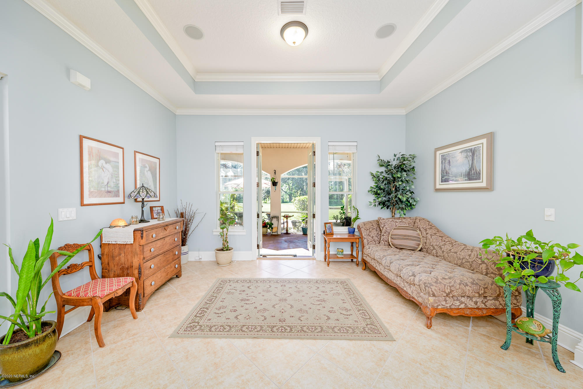 8313 Sheila Drive St. Augustine, FL 32092 - Photo 12 of 54 a living room with furniture and a potted plant