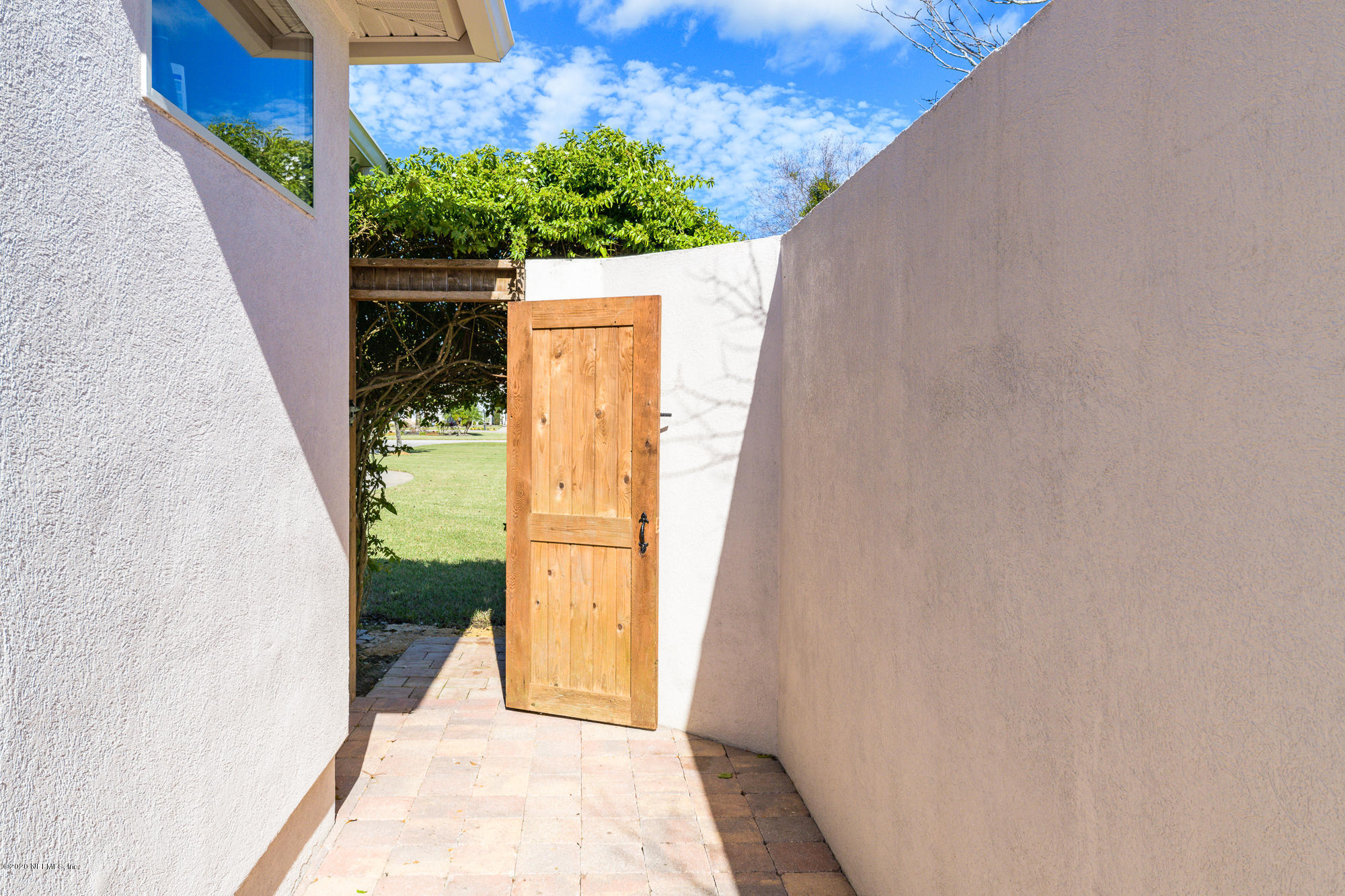 8313 Sheila Drive St. Augustine, FL 32092 - Photo 31 of 54 Door to Yard