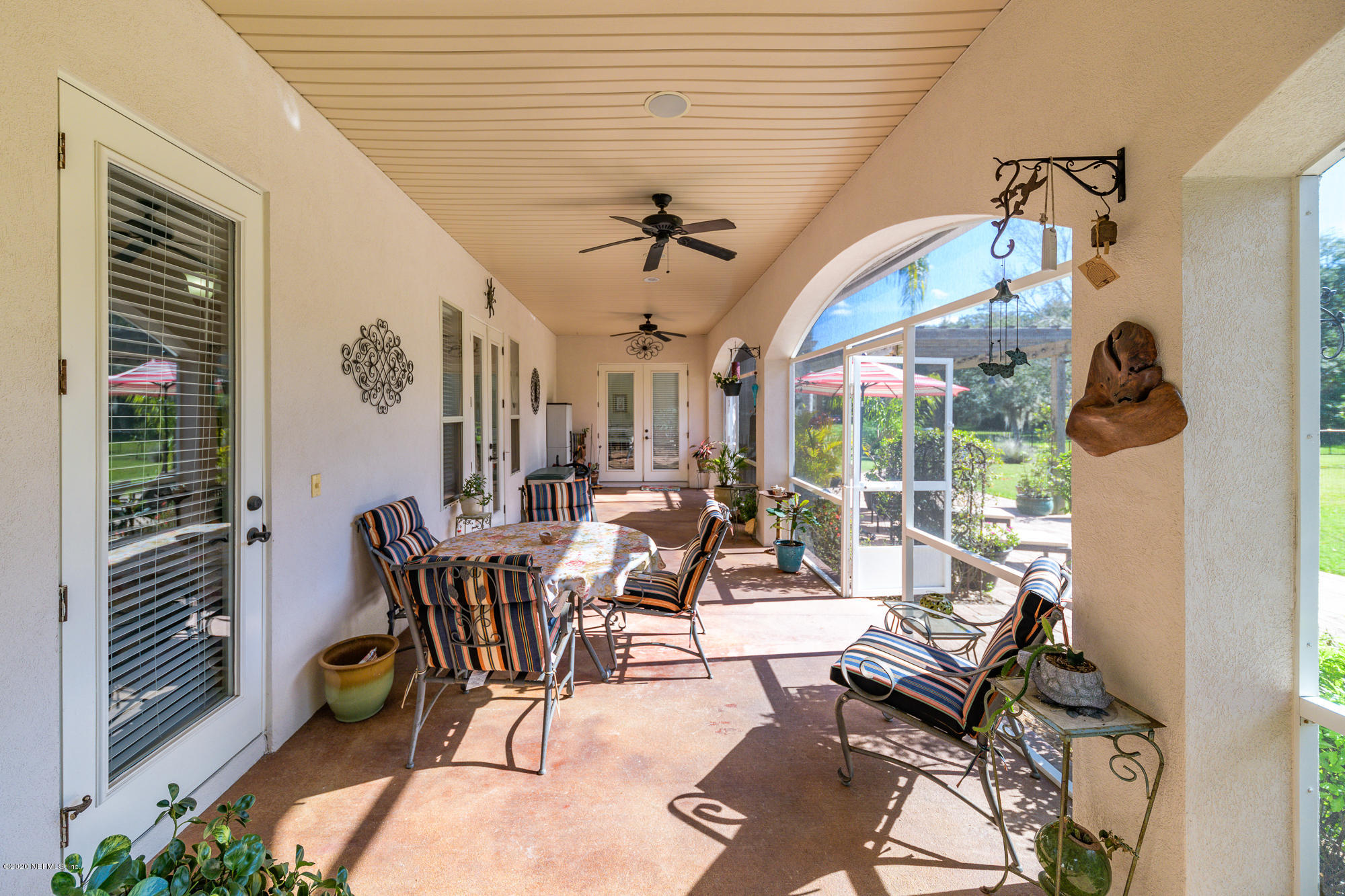 8313 Sheila Drive St. Augustine, FL 32092 - Photo 41 of 54 a view of a dining room with furniture window and outside view