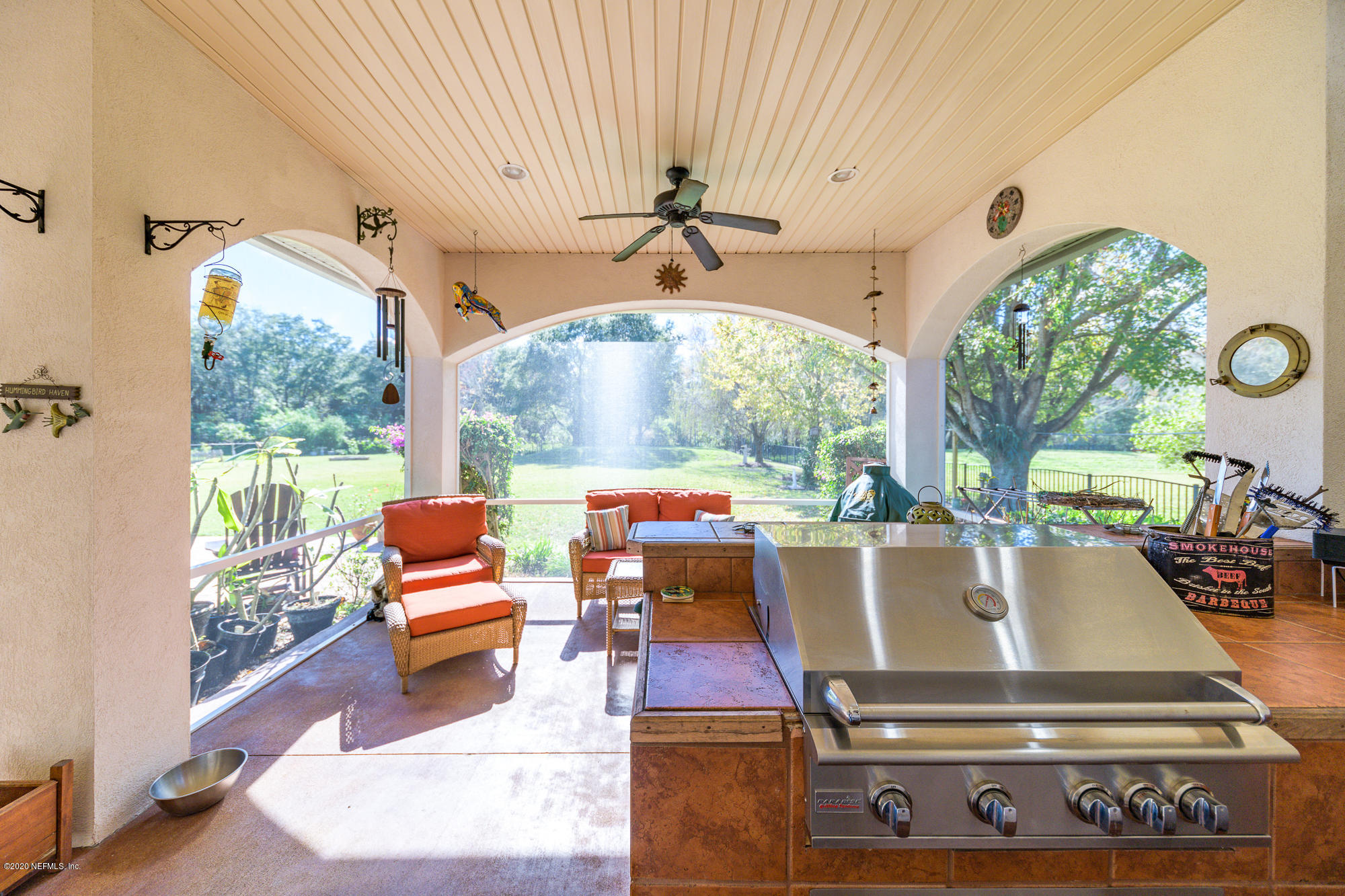 8313 Sheila Drive St. Augustine, FL 32092 - Photo 43 of 54 a living room with furniture and a large window