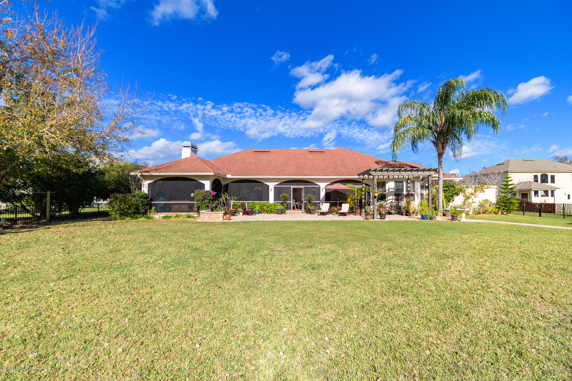 8313 Sheila Drive St. Augustine, FL 32092 - Photo 48 of 54 a front view of a house with a big yard