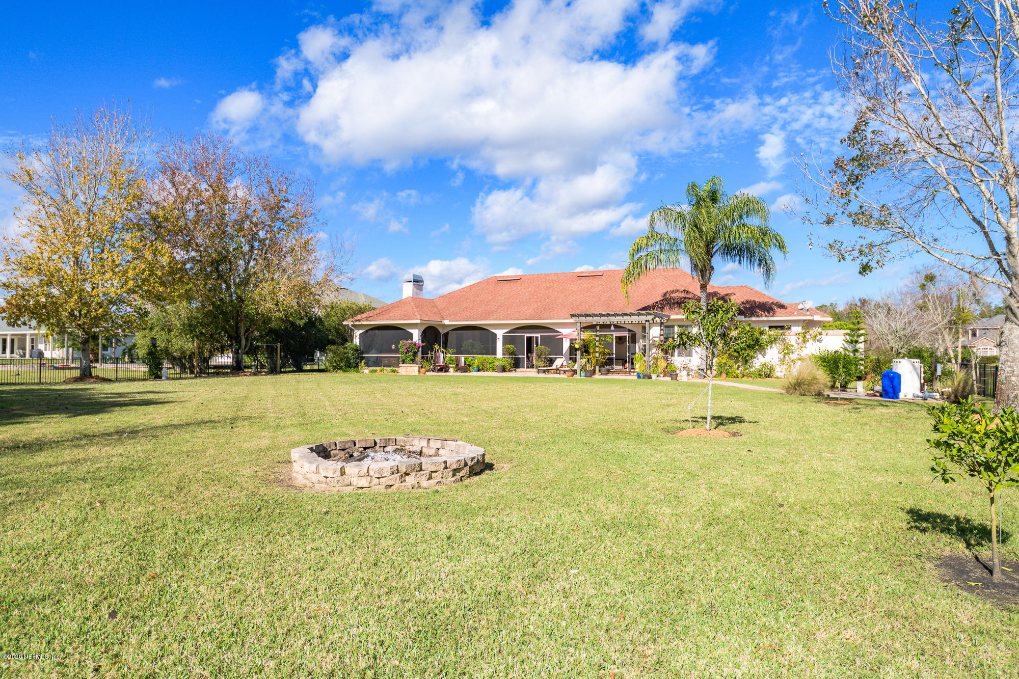 8313 Sheila Drive St. Augustine, FL 32092 - Photo 49 of 54 a view of swimming pool is middle in the garden