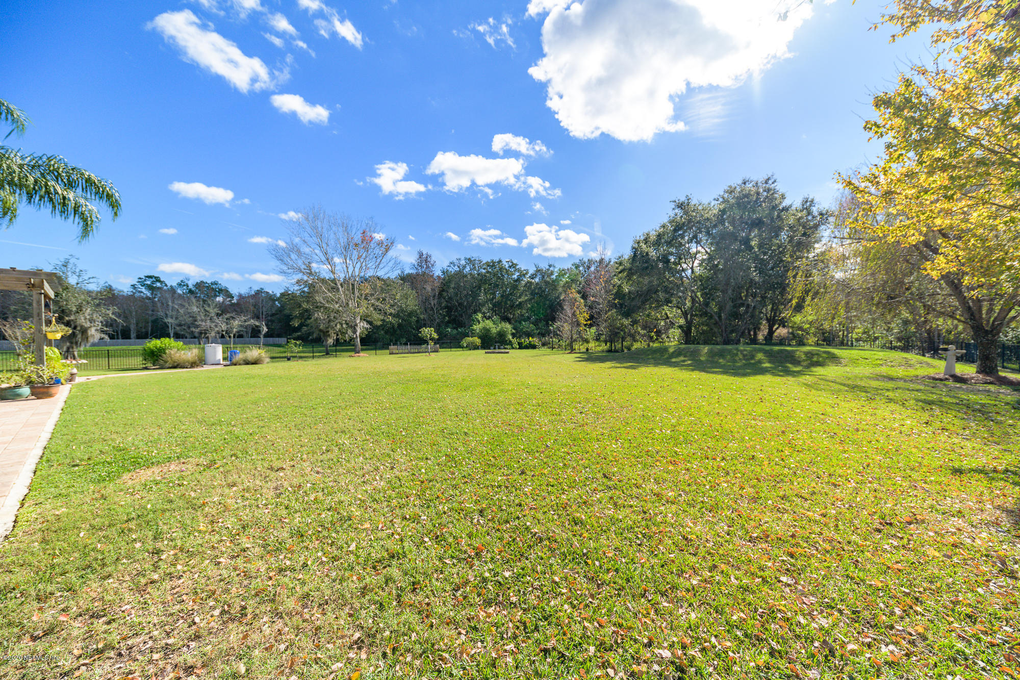 8313 Sheila Drive St. Augustine, FL 32092 - Photo 50 of 54 a view of a fountain is middle in the garden