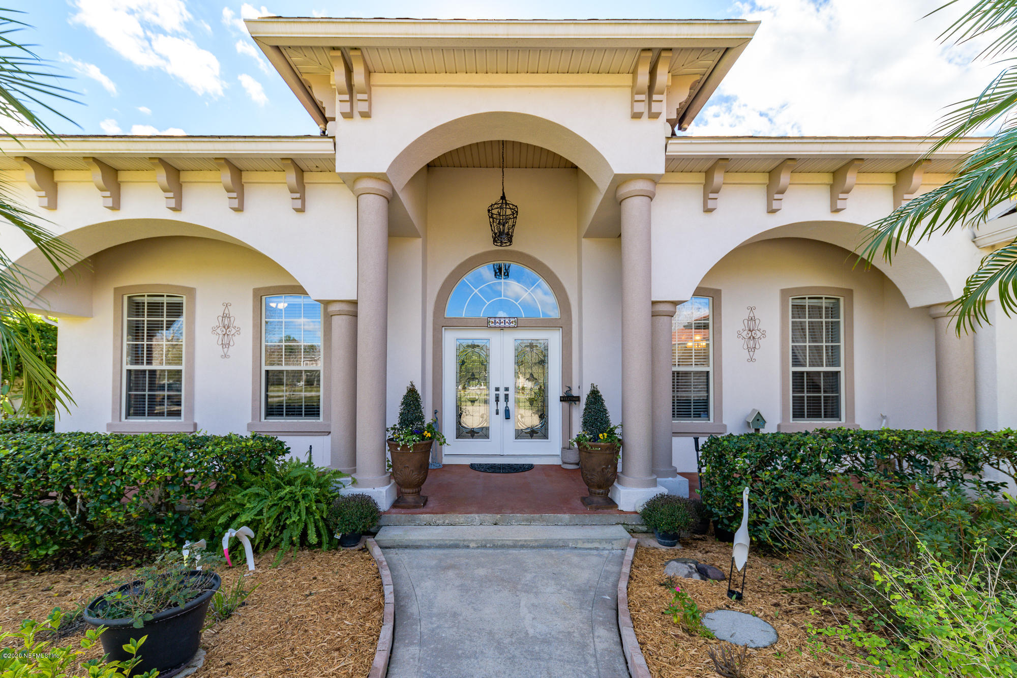 8313 Sheila Drive St. Augustine, FL 32092 - Photo 7 of 54 a front view of a house