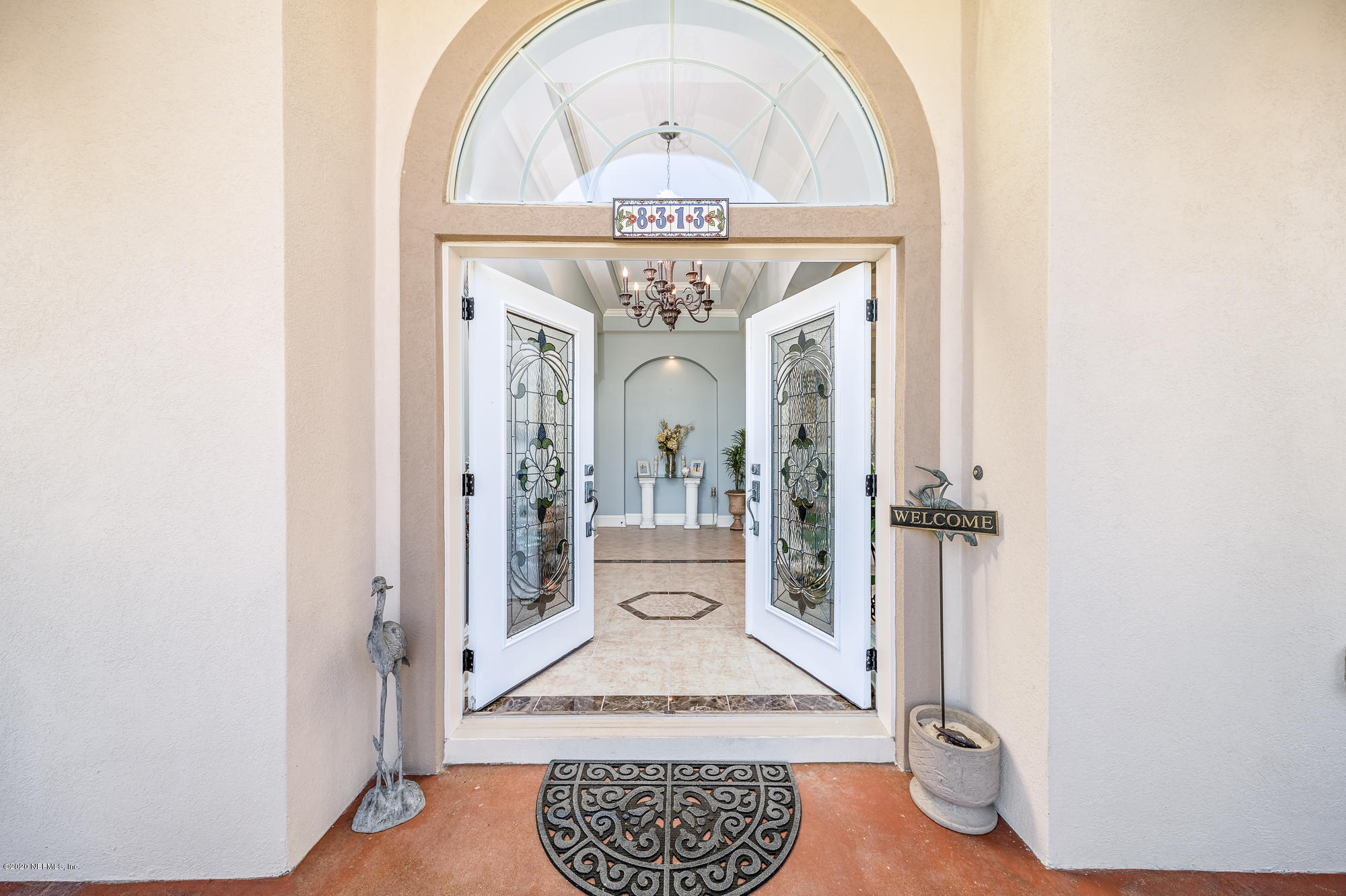 8313 Sheila Drive St. Augustine, FL 32092 - Photo 8 of 54 a view of living room with a fireplace