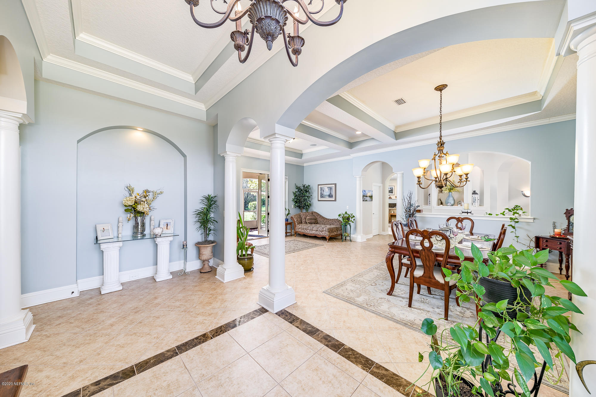 8313 Sheila Drive St. Augustine, FL 32092 - Photo 9 of 54 a very nice looking dining room with a chandelier