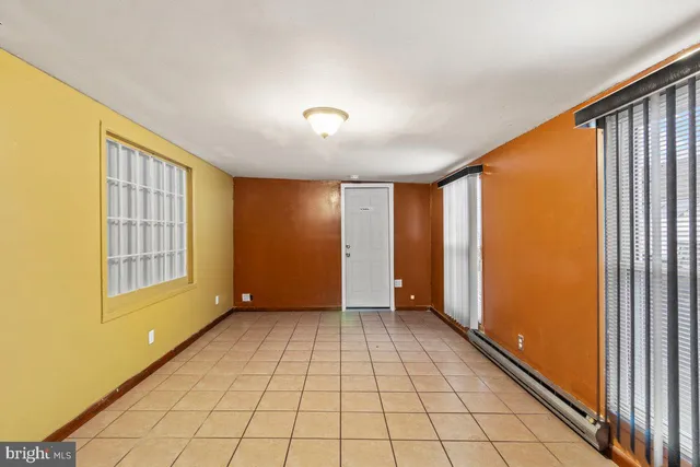 a view of an empty room and window