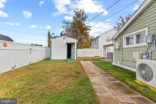 a house view with a backyard space