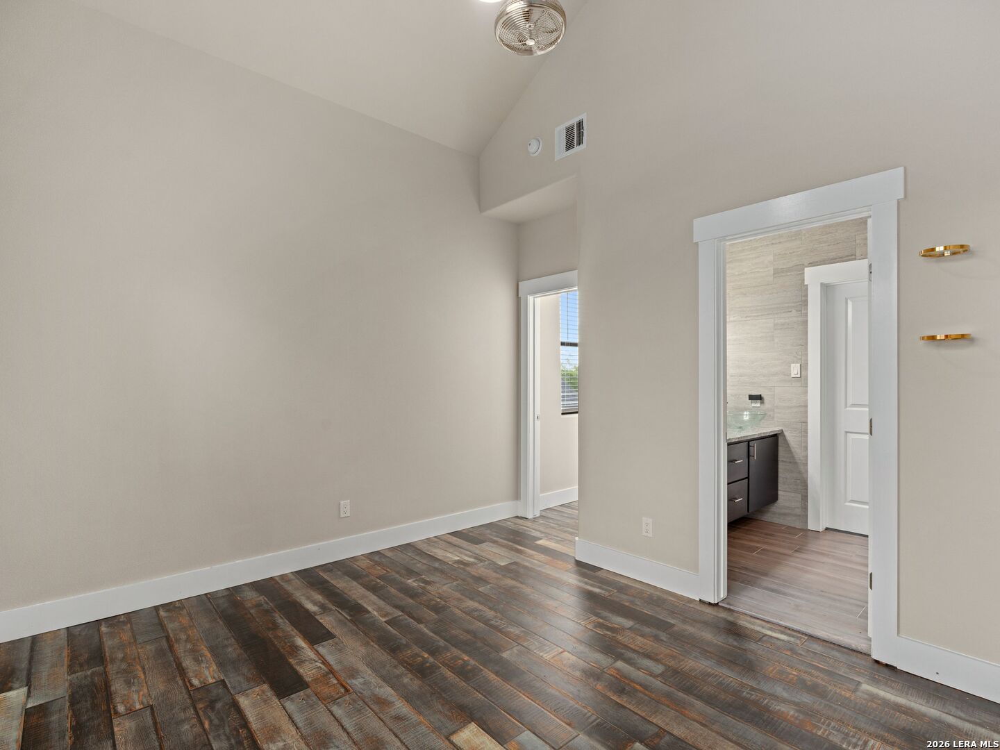 1146 Victoria Avenue Spring Branch, TX 78070 - Photo 39 of 89 a view of an empty room with wooden floor and closet