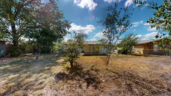 a view of backyard of house