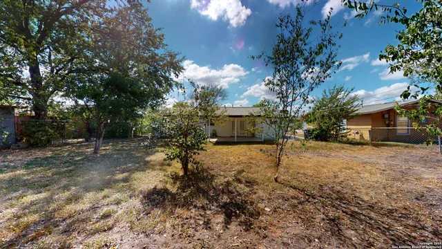 a view of backyard of house