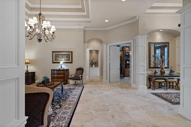 a room with furniture a rug and a window