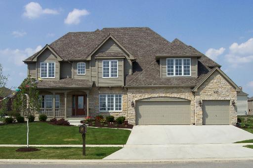 4027 Champion Road Naperville, IL 60564 - Photo 1 of 1 front view of a house with a yard