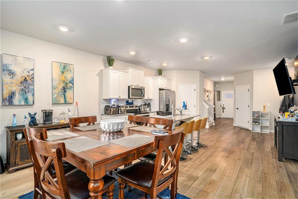11940 Brightside Parkway Hampton, GA 30228 - Photo 10 of 31 a view of a dining room with furniture