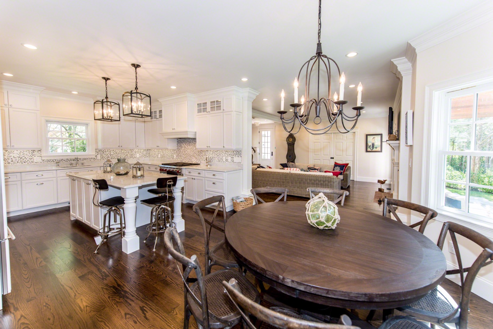 61 Clevelandtown Road Edgartown, MA 02539 - Photo 11 of 43 a view of a dining room with furniture a chandelier and wooden floor