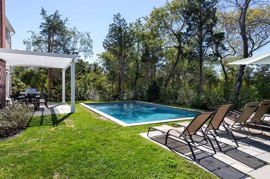 61 Clevelandtown Road Edgartown, MA 02539 - Photo 4 of 43 a view of a backyard with swimming pool