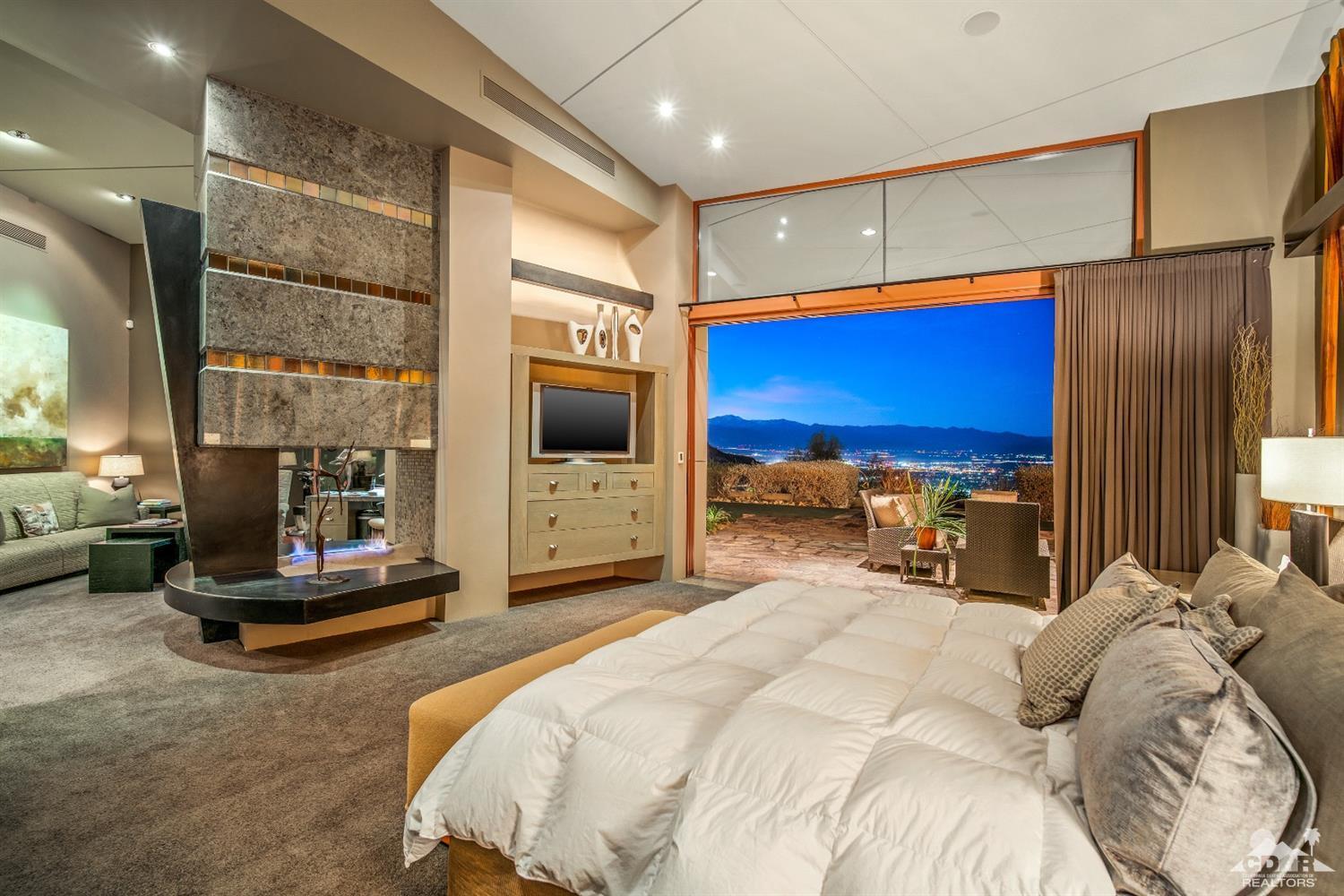 45 Sky Ridge Road Rancho Mirage, CA 92270 - Photo 18 of 90 a bed room with a bed and a television