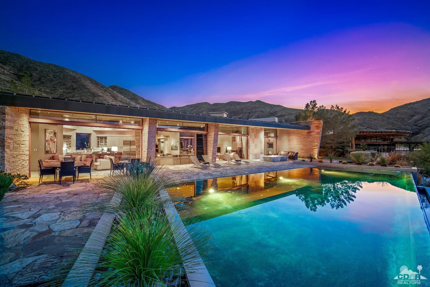 45 Sky Ridge Road Rancho Mirage, CA 92270 - Photo 25 of 90 a view of a house with swimming pool and porch
