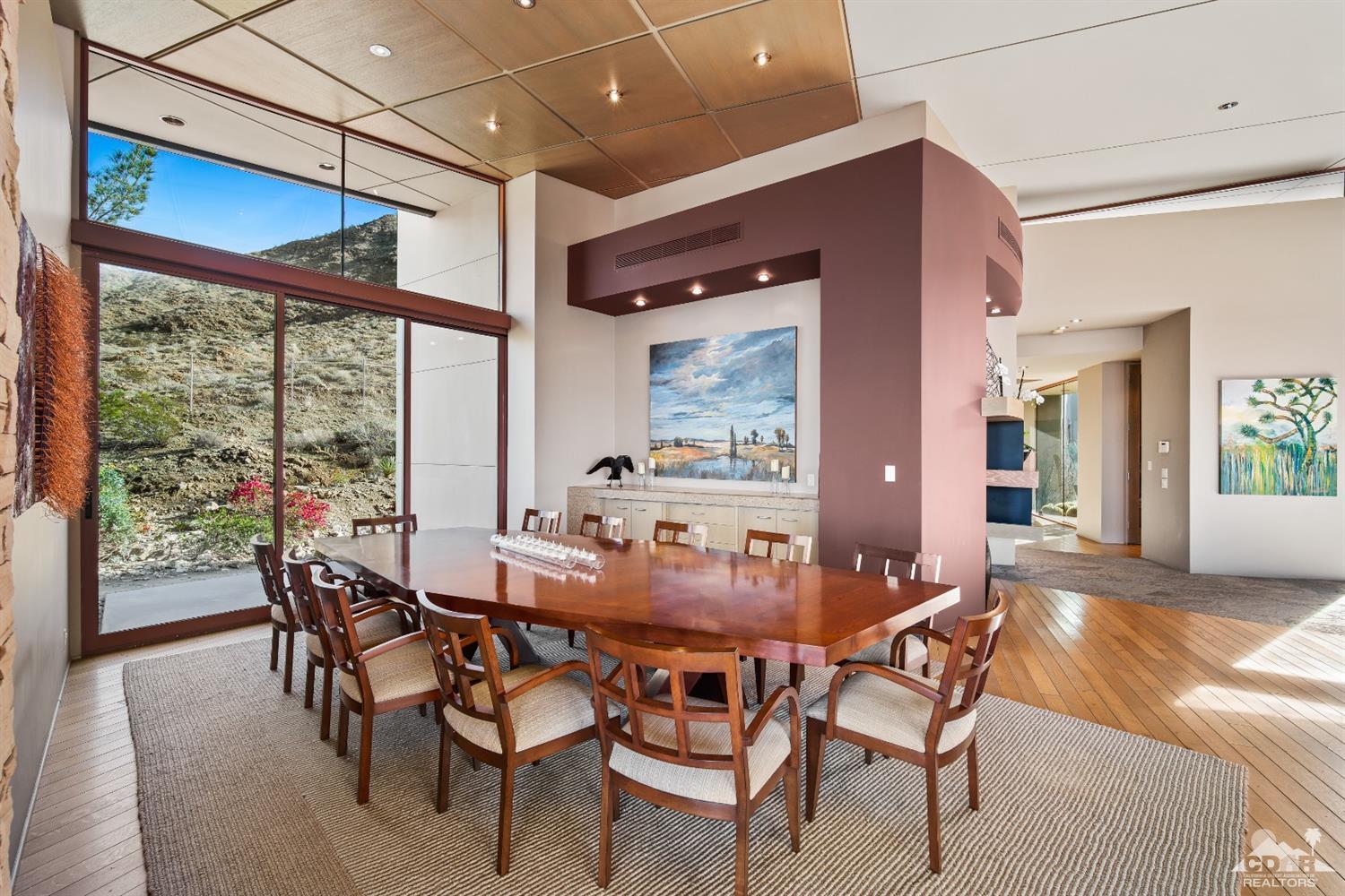 45 Sky Ridge Road Rancho Mirage, CA 92270 - Photo 42 of 90 a dining room with furniture a chandelier and wooden floor
